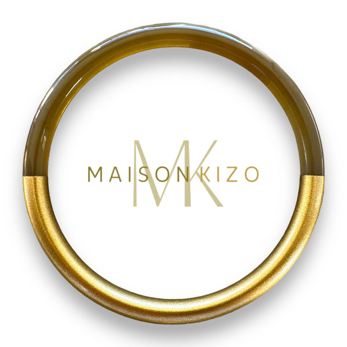 Lacquered gold buffalo horn bangle: 65/67 mm